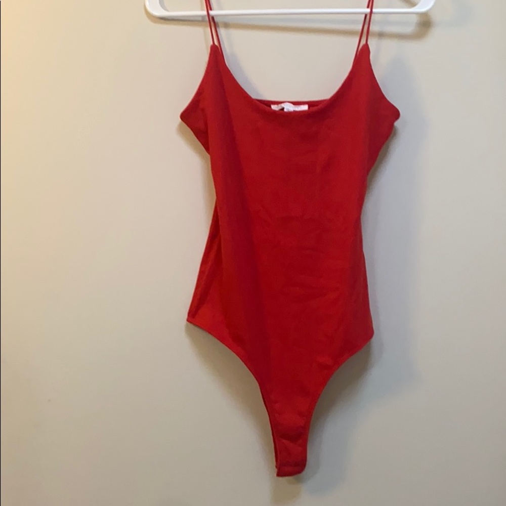 Red ribbed body suit